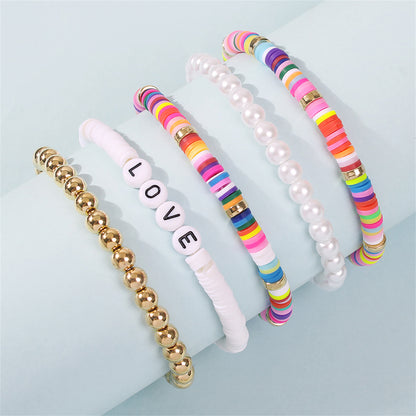 Pearl and 18K Gold-Plated 'Love' Stretch Bracelet Set, gold bracelet for women, elegant gift for her, detail close-up