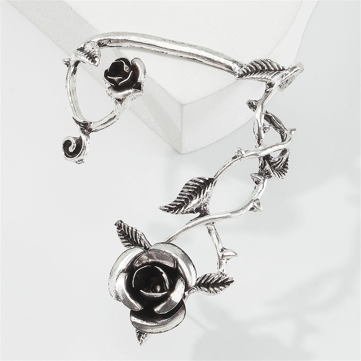 Black Enamel and Silver-Plated Rose Ear Cuff, silver stud earrings for women, vintage-inspired design, detail close-up