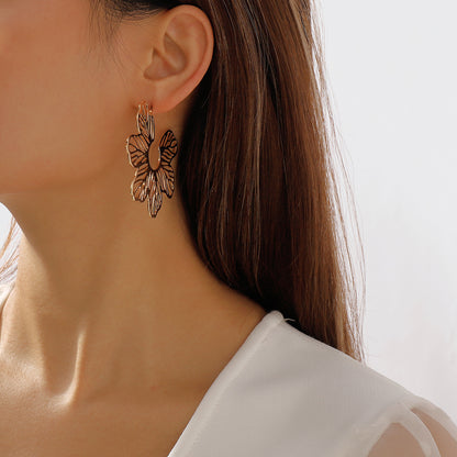 18K Gold-Plated Cutout Flower Huggie Earrings, gold huggie earrings, vintage-inspired design, side view