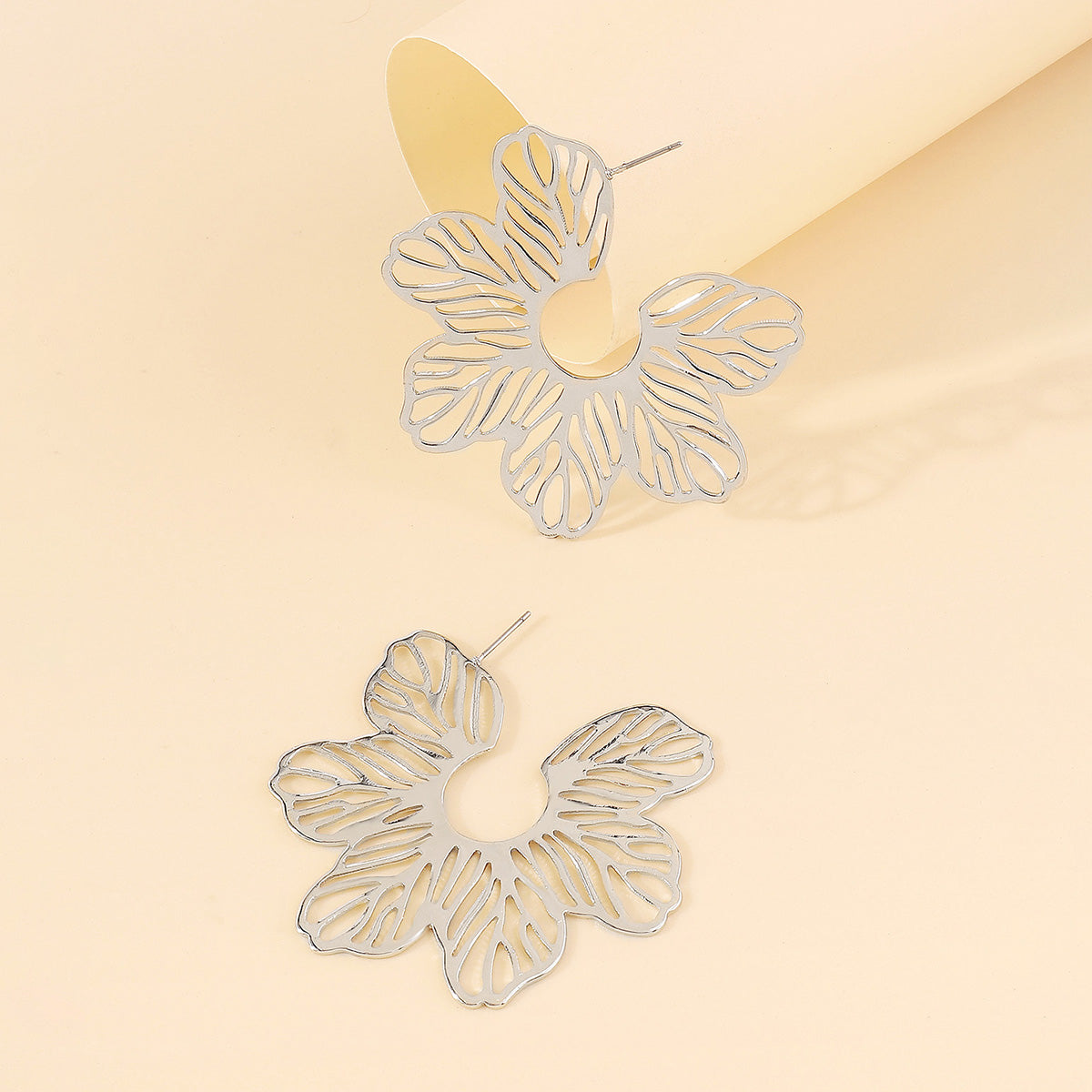 Silver-Plated Cutout Flower Huggie Earrings, silver huggie earrings, everyday style, detail close-up