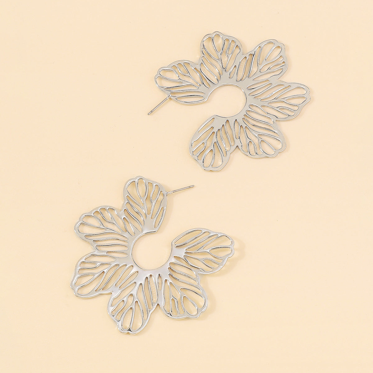Silver-Plated Cutout Flower Huggie Earrings, silver huggie earrings, everyday style, lifestyle look