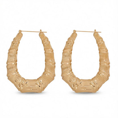 18K Gold-Plated Oval Bamboo Huggie Earrings, gold huggie earrings, botanical inspired, side view
