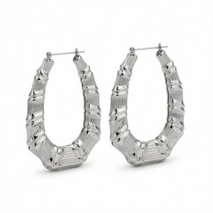 Silver-Plated Oval Bamboo Huggie Earrings, silver huggie earrings, botanical inspired, side view