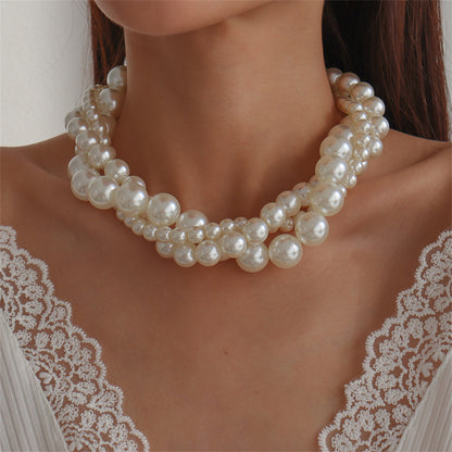 Pearl and Silver-Plated Interlocked Necklace, silver pendant necklace for women, vintage-inspired design, side view
