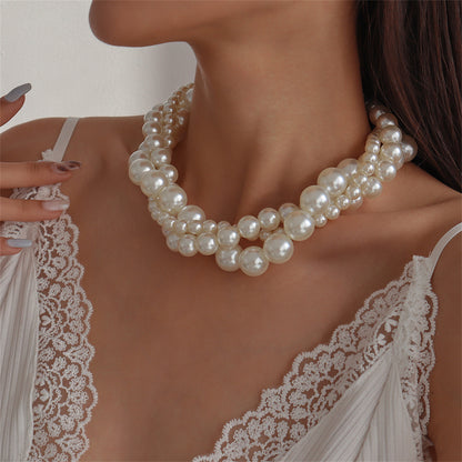 Pearl and Silver-Plated Interlocked Necklace, silver pendant necklace for women, vintage-inspired design, detail close-up