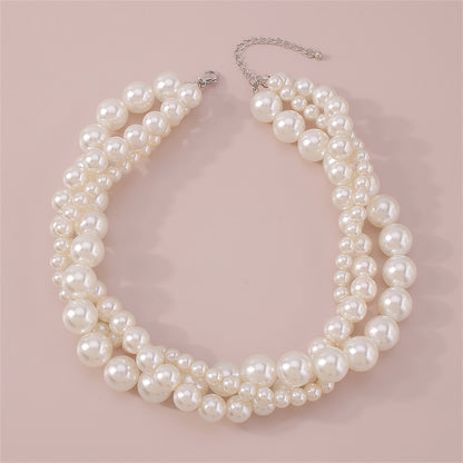 Pearl and Silver-Plated Interlocked Necklace, silver pendant necklace for women, vintage-inspired design, lifestyle look