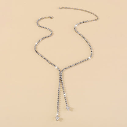 Crystal and Cubic Zirconia Silver-Plated Arrow Lariat Necklace, silver pendant necklace for women, detail close-up