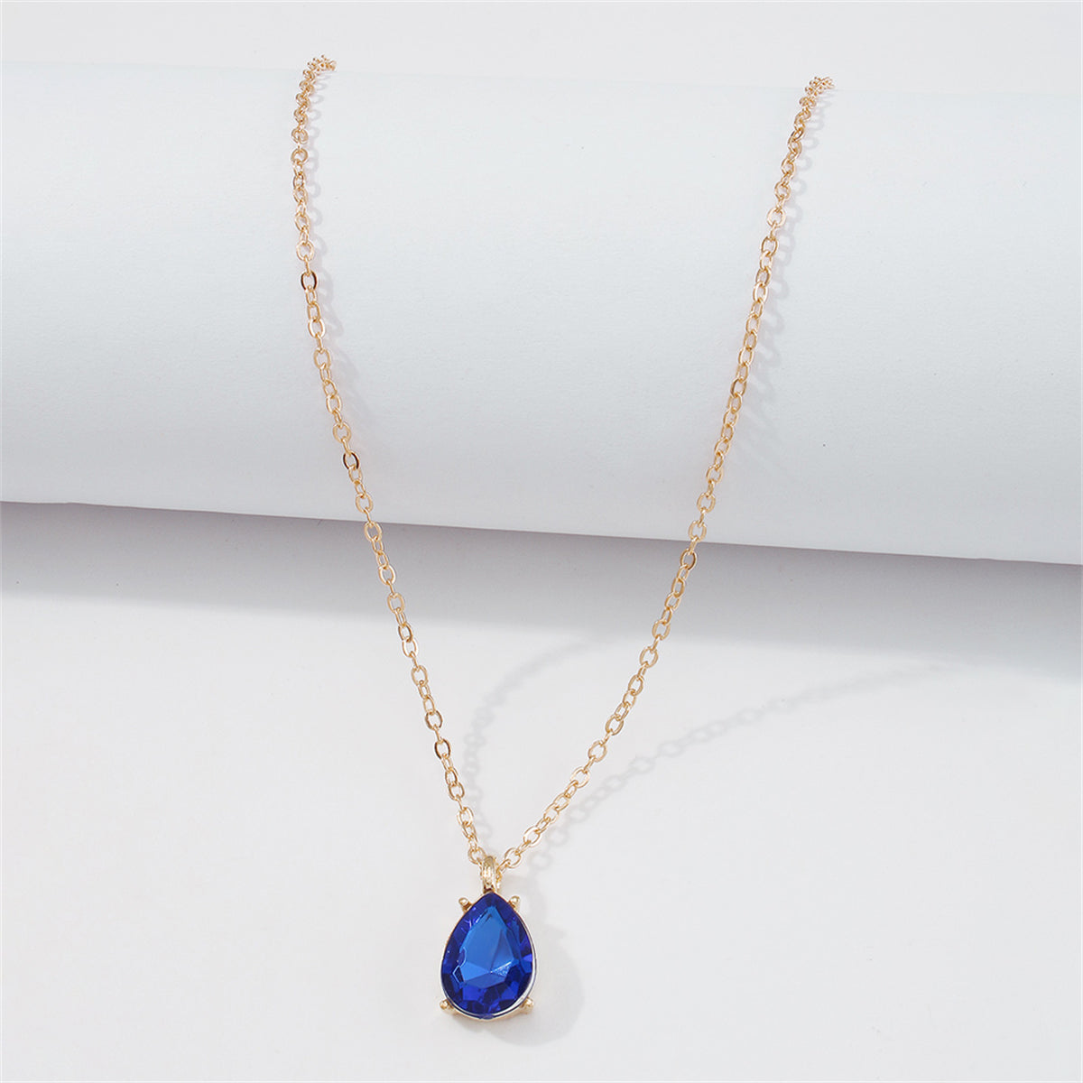 Blue Crystal and 18K Gold-Plated Teardrop Pendant Necklace, gold pendant necklace for women, detail close-up