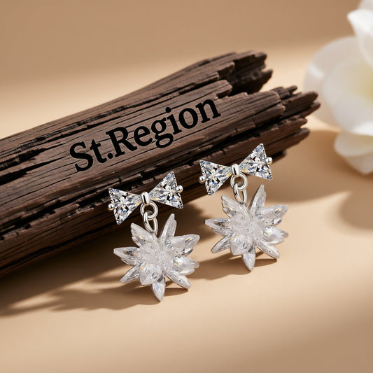 Cubic Zirconia and Crystal Silver-Plated Bow and Snowflake Drop Earrings, silver drop earrings for women, front view