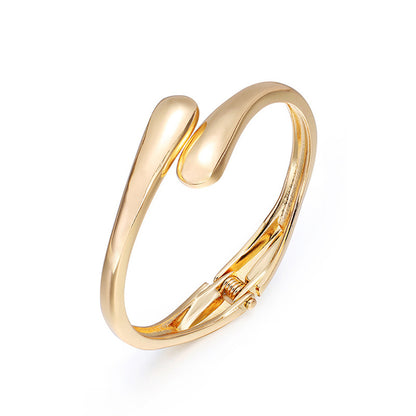 18K Gold-Plated Drop Bypass Hinge Bangle, gold bangle bracelet, botanical inspired, front view
