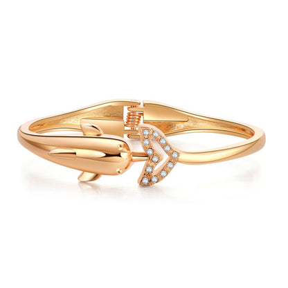 Cubic Zirconia and 18K Gold-Plated Openwork Dolphin Hinge Bangle, gold bangle bracelet, botanical inspired, front view