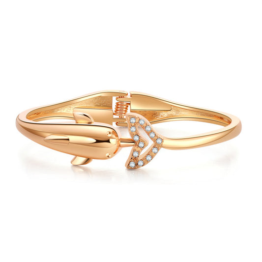 Cubic Zirconia and 18K Gold-Plated Openwork Dolphin Hinge Bangle, gold bangle bracelet, botanical inspired, front view