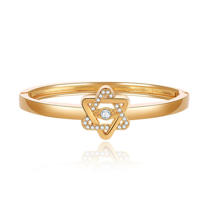 Cubic Zirconia and 18K Gold-Plated Flush-Set Openwork Star Hinge Bangle, gold bangle bracelet, botanical inspired, front view