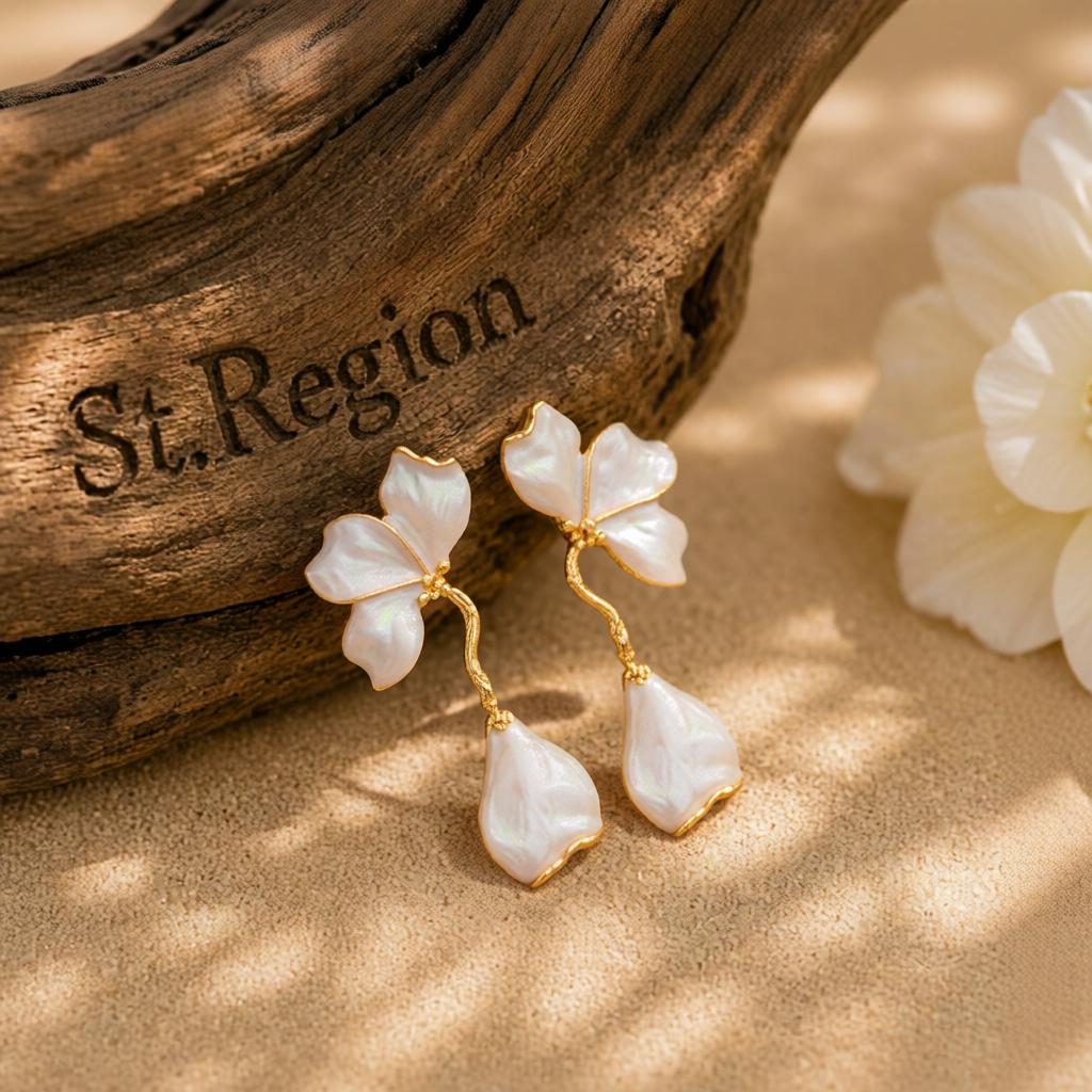 White Enamel and Goldtone Petals Dangle Earrings, gold drop earrings for women, botanical inspired, front view