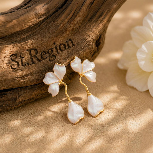 White Enamel and Goldtone Petals Dangle Earrings, gold drop earrings for women, botanical inspired, front view