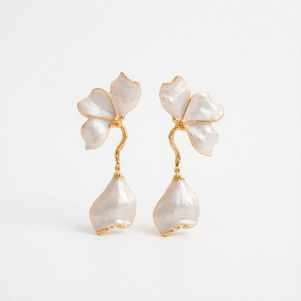 White Enamel and Goldtone Petals Dangle Earrings, gold drop earrings for women, botanical inspired, side view