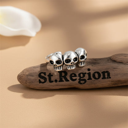 Silvertone Three-Skulls Ear Cuff