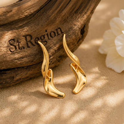 Goldtone Liquid Feather Statement Dangle Earrings