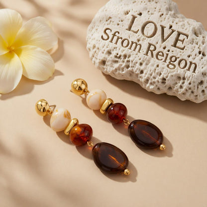 Amber Resin and Goldtone Tiered Irregular Beads Dangle Earrings, gold drop earrings for women, everyday style, lifestyle look