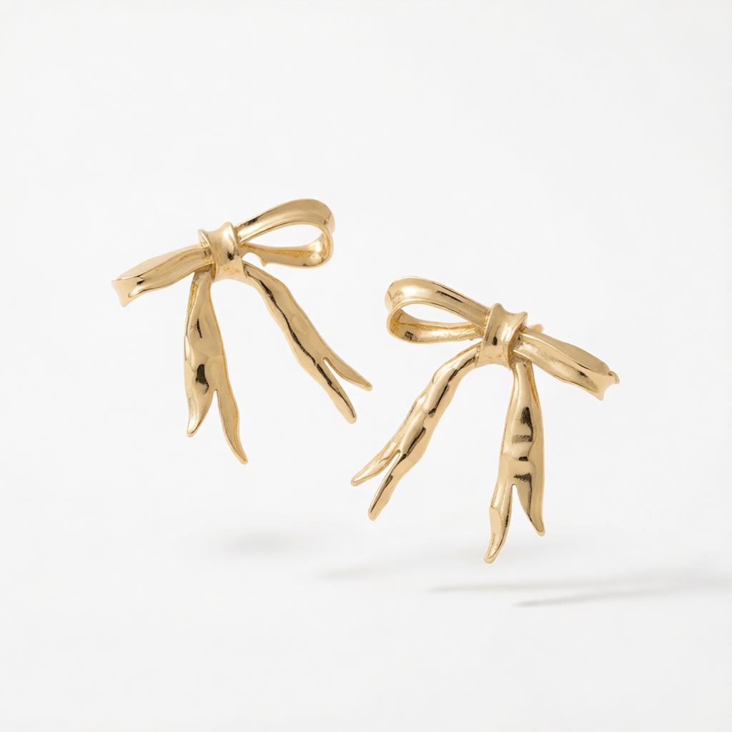 Goldtone Hammered Bow Stud Earrings, cubic zirconia stud earrings for women, botanical inspired, side view