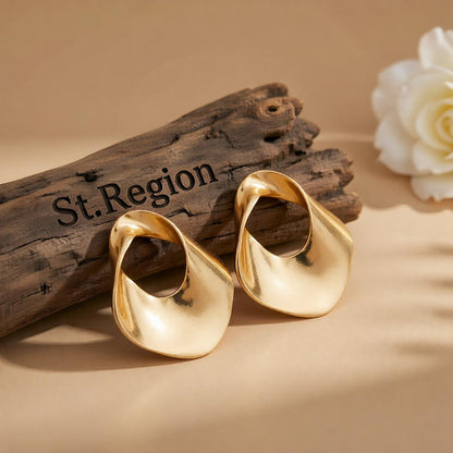 Goldtone Open Twisted Irregular Statement Earrings, cubic zirconia stud earrings for women, front view