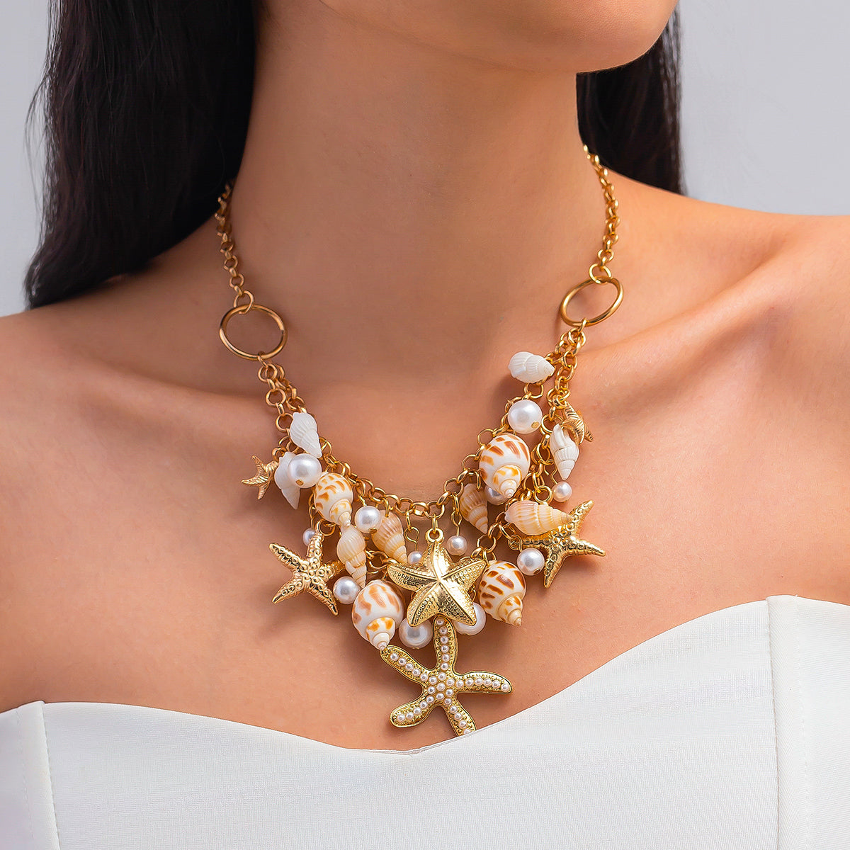 Pearl and Goldtone Starfish Conch Cluster Statement Necklace, dainty minimalist design, lifestyle look