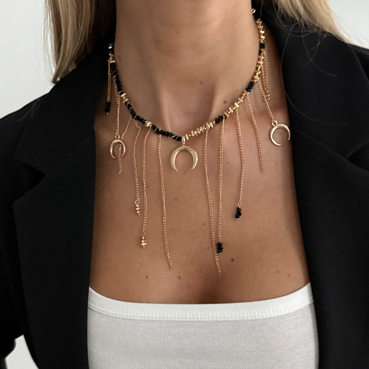Black Acrylic and Goldtone Moon Pendant Tassel Necklace, dainty minimalist design, lifestyle look