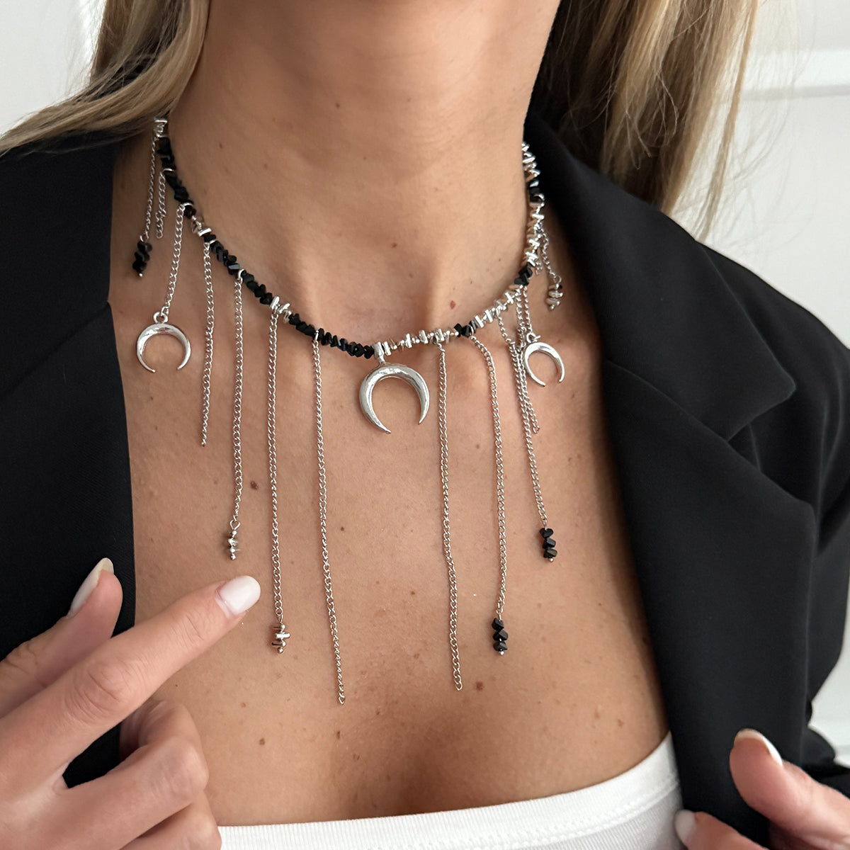 Black Acrylic and Silvertone Moon Pendant Tassel Necklace, vintage-inspired design, lifestyle look
