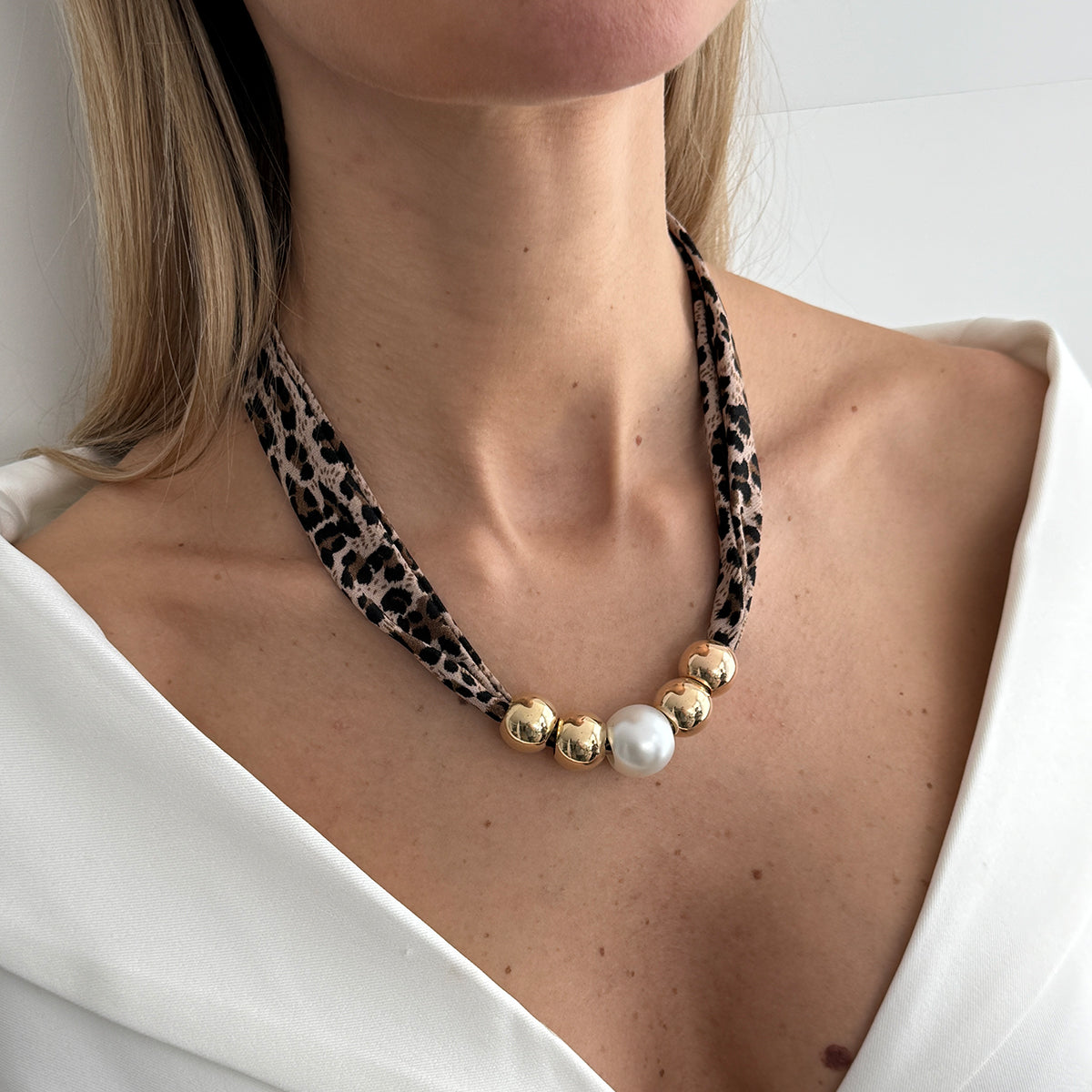 Leopard Print Polyster and Pearl Goldtone Ball Collar Necklace, dainty minimalist design, styled look