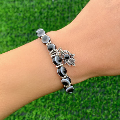 Black Acrylic and Silver-Plated Evil Eye Hamsa Charm Bracelet, silver bracelet for women, vintage-inspired design, front view