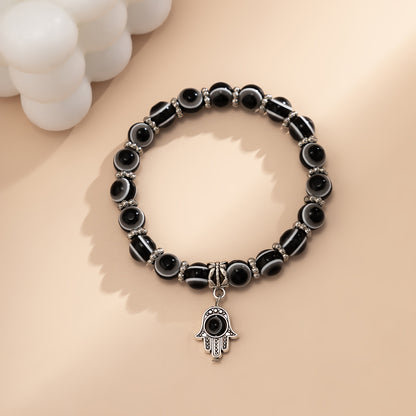 Black Acrylic and Silver-Plated Evil Eye Hamsa Charm Bracelet, silver bracelet for women, lifestyle look
