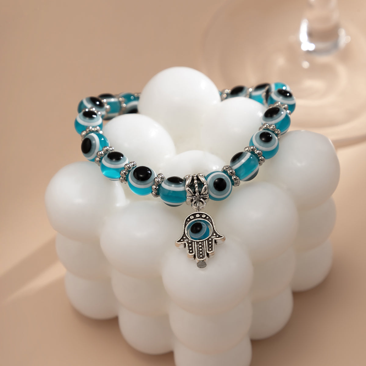 Sea Blue Acrylic and Silver-Plated Evil Eye Hamsa Charm Bracelet, silver bracelet for women, everyday style, side view
