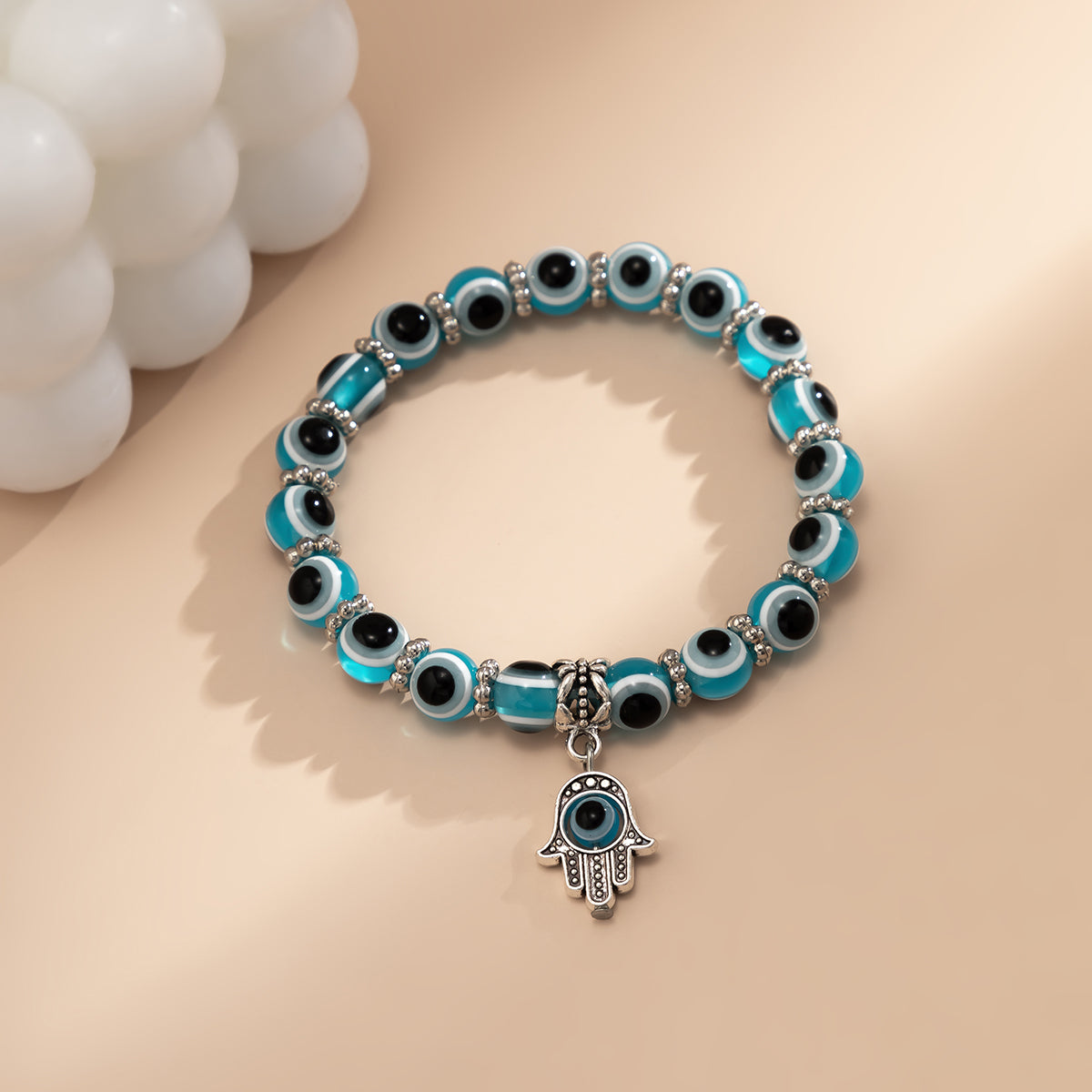 Sea Blue Acrylic and Silver-Plated Evil Eye Hamsa Charm Bracelet, silver bracelet for women, everyday style, lifestyle look