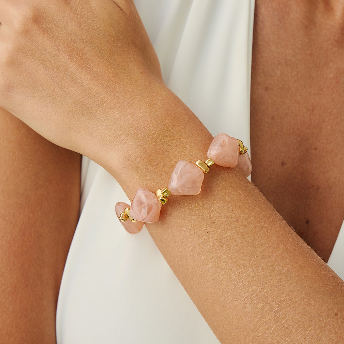 Pink Resin and Goldtone Beads Rhombus Station Stretch Bracelet, vintage-inspired design, lifestyle look