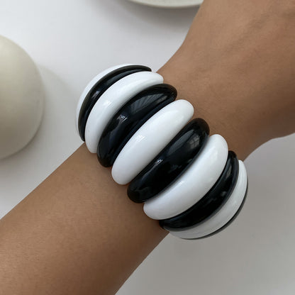 Black and White Resin Tire Stretch Bracelet, botanical inspired, lifestyle look