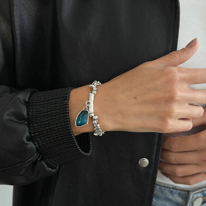 Teal Crystal and Silvertone Beads Irregular Charm Stretch Bracelet, botanical inspired, styled look
