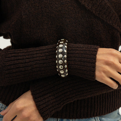 Black Resin and Silvertone Layered Spot Cuff, silver bracelet for women, vintage-inspired design, styled look