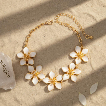 White Enamel and Goldtone Flowers Charm Anklet, gold anklet bracelet, vintage-inspired design, lifestyle look