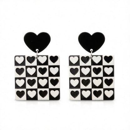 Black Acrylic Checkerboard Heart Earrings, drop earrings for women, dainty minimalist design, side view