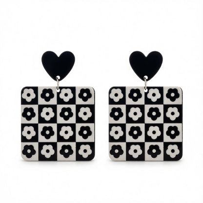 Black Acrylic Heart and Flower Earrings, drop earrings for women, botanical inspired, side view