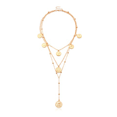 Stunning 18K gold-plated lariat necklace showcasing a coin chain and a captivating 'Capricorn' pendant.