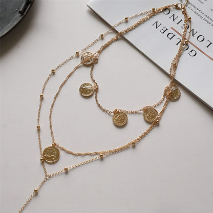 18K Gold-Plated 'Capricorn' Coin Layered Lariat Necklace, gold pendant necklace for women, botanical inspired, lifestyle look