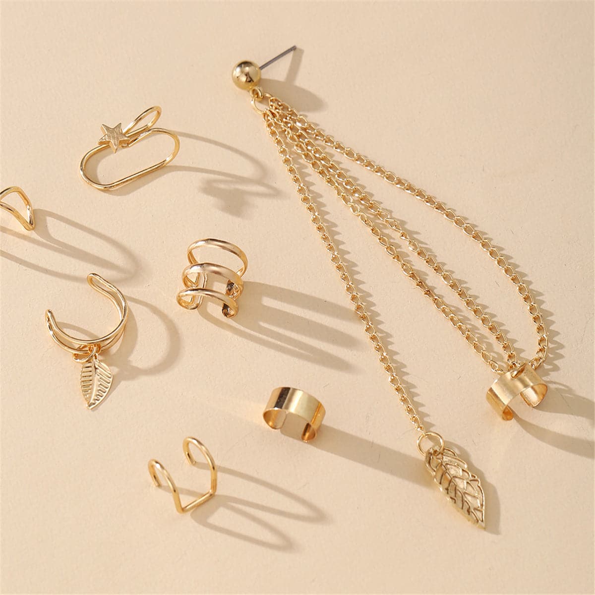 18K Gold-Plated Leaf Star Cuff Earring Set, gold drop earrings for women, botanical inspired, detail close-up