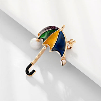 Colored Enamel and Cubic Zirconia Pearl 18K Gold-Plated Umbrella Brooch, gold brooch pin, dainty minimalist design, side view