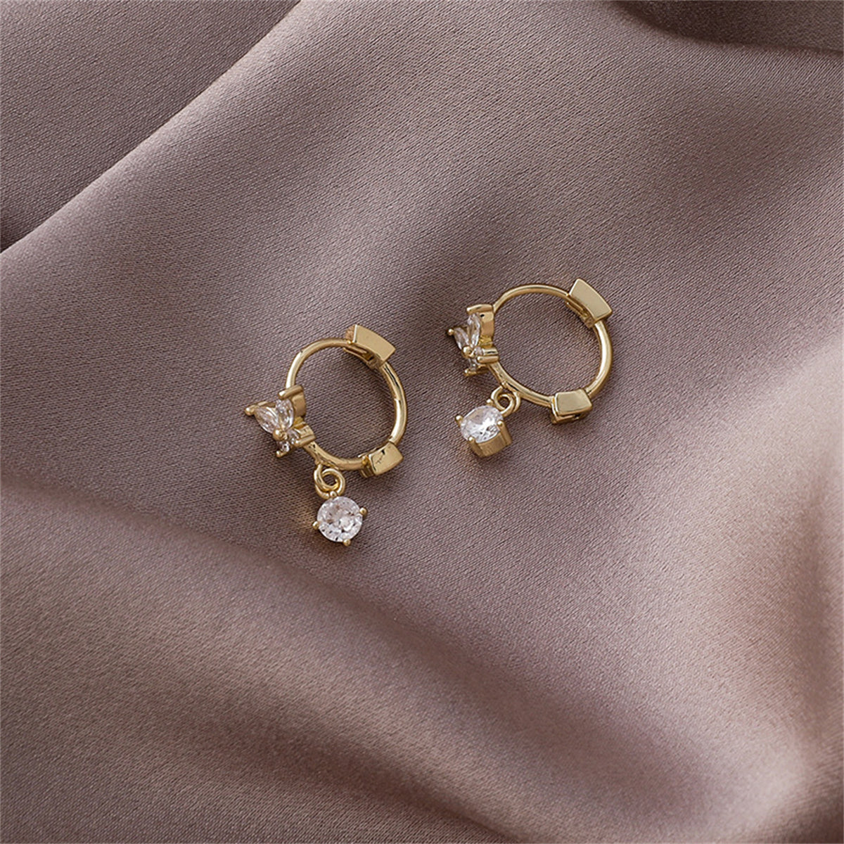 Cubic Zirconia and 18K Gold-Plated Butterfly Huggie Earrings, gold huggie earrings, dainty minimalist design, side view