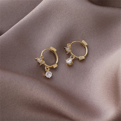 Cubic Zirconia and 18K Gold-Plated Butterfly Huggie Earrings, gold huggie earrings, dainty minimalist design, side view