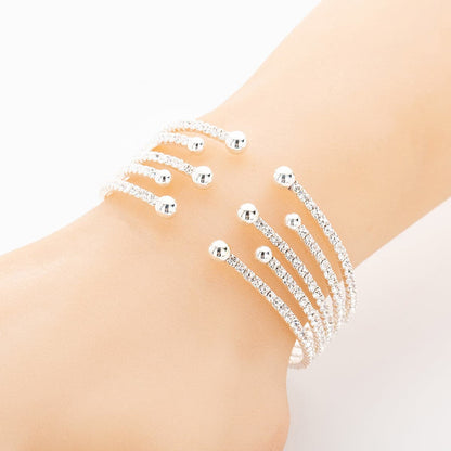 Cubic Zirconia and 18K Gold-Plated Bead End Cuff, gold bracelet for women, dainty minimalist design, side view