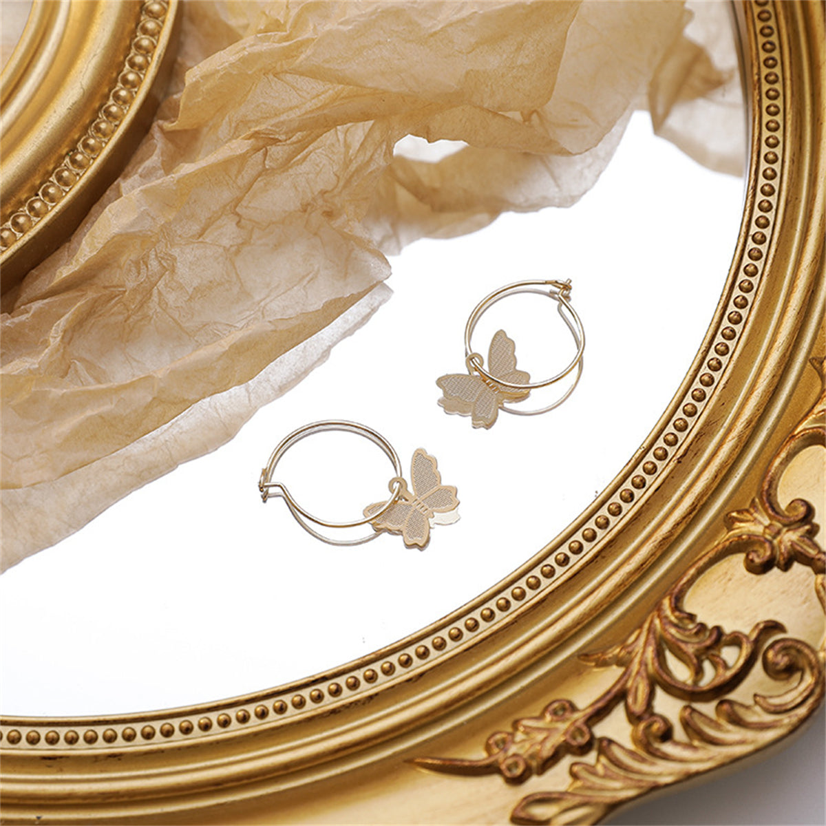 Stunning 18K gold-plated butterfly earrings that elevate your style with their delicate and whimsical design.