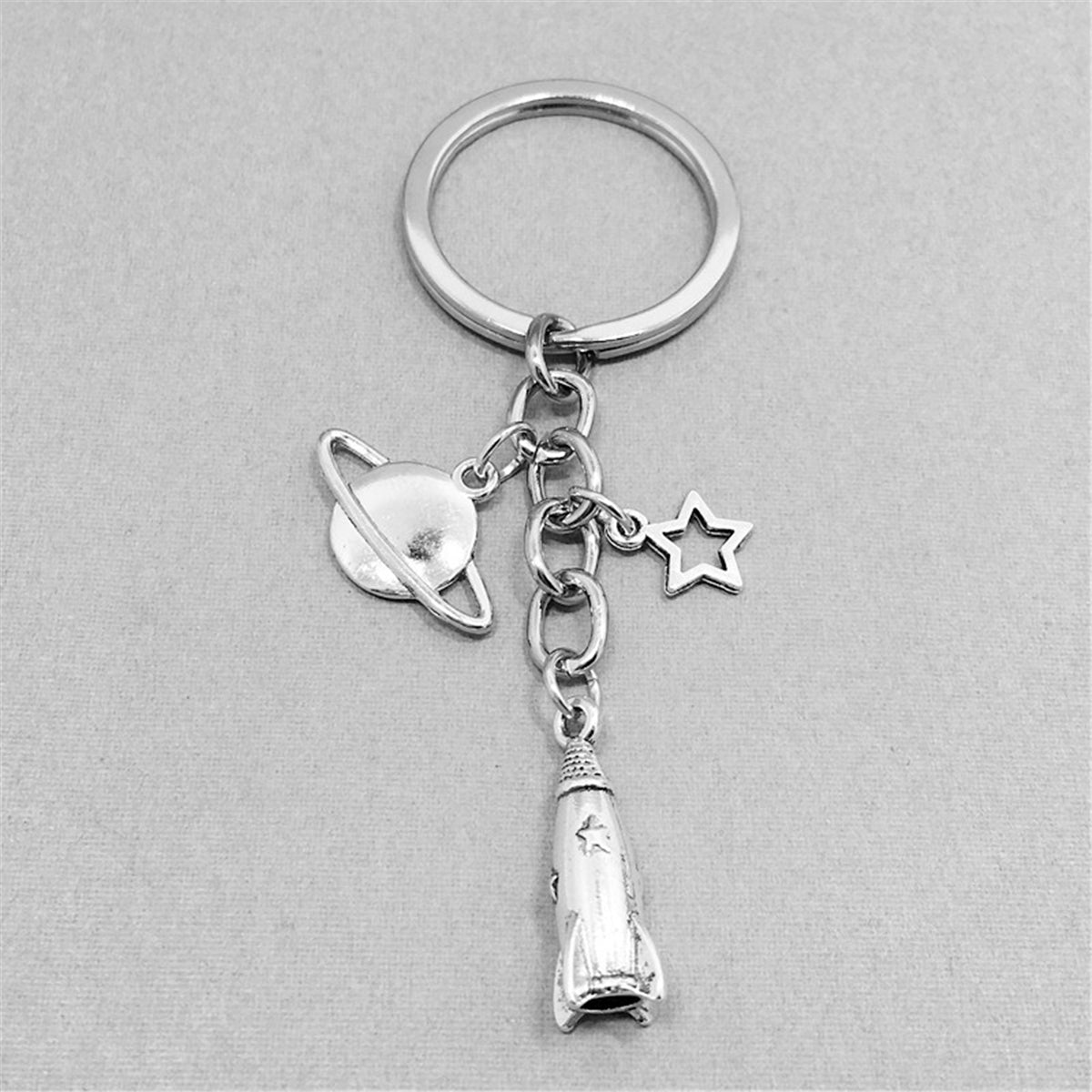 Silver-Plated Rocket Key Chain, silver pendant necklace for women, botanical inspired, detail close-up