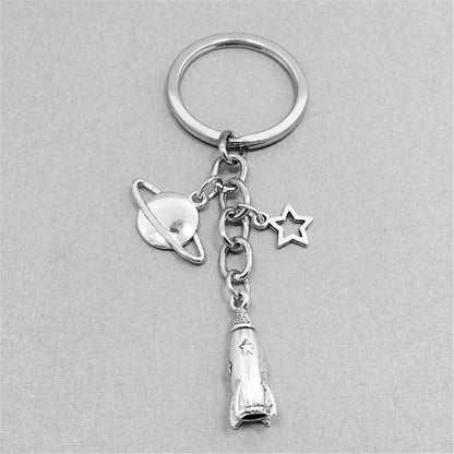 Silver-Plated Rocket Key Chain, silver pendant necklace for women, botanical inspired, detail close-up